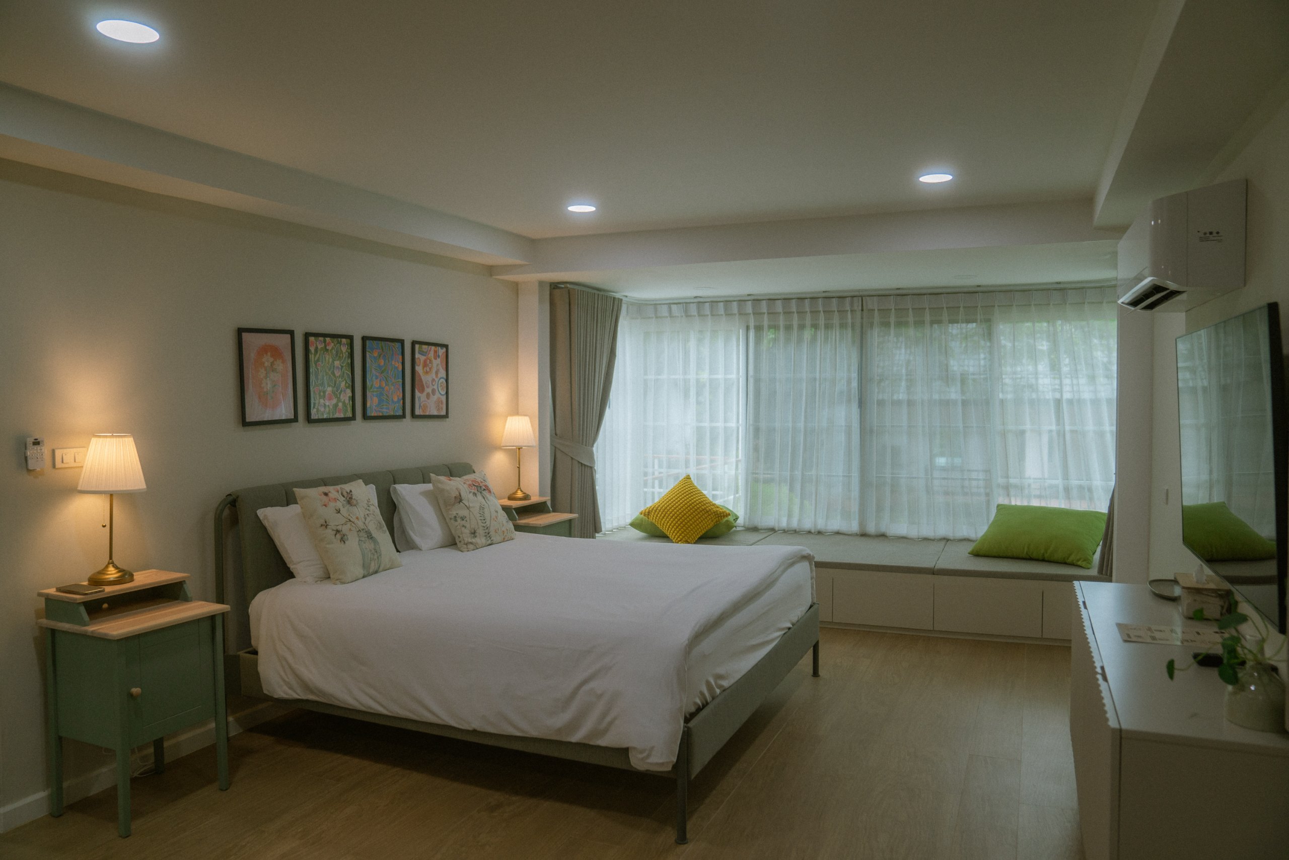 Bedroom with king bed and window seat
